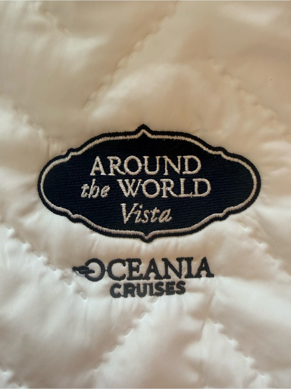 Oceania Branded Holloway White Quilted Vest with Navy Crest - Picture 2 of 5